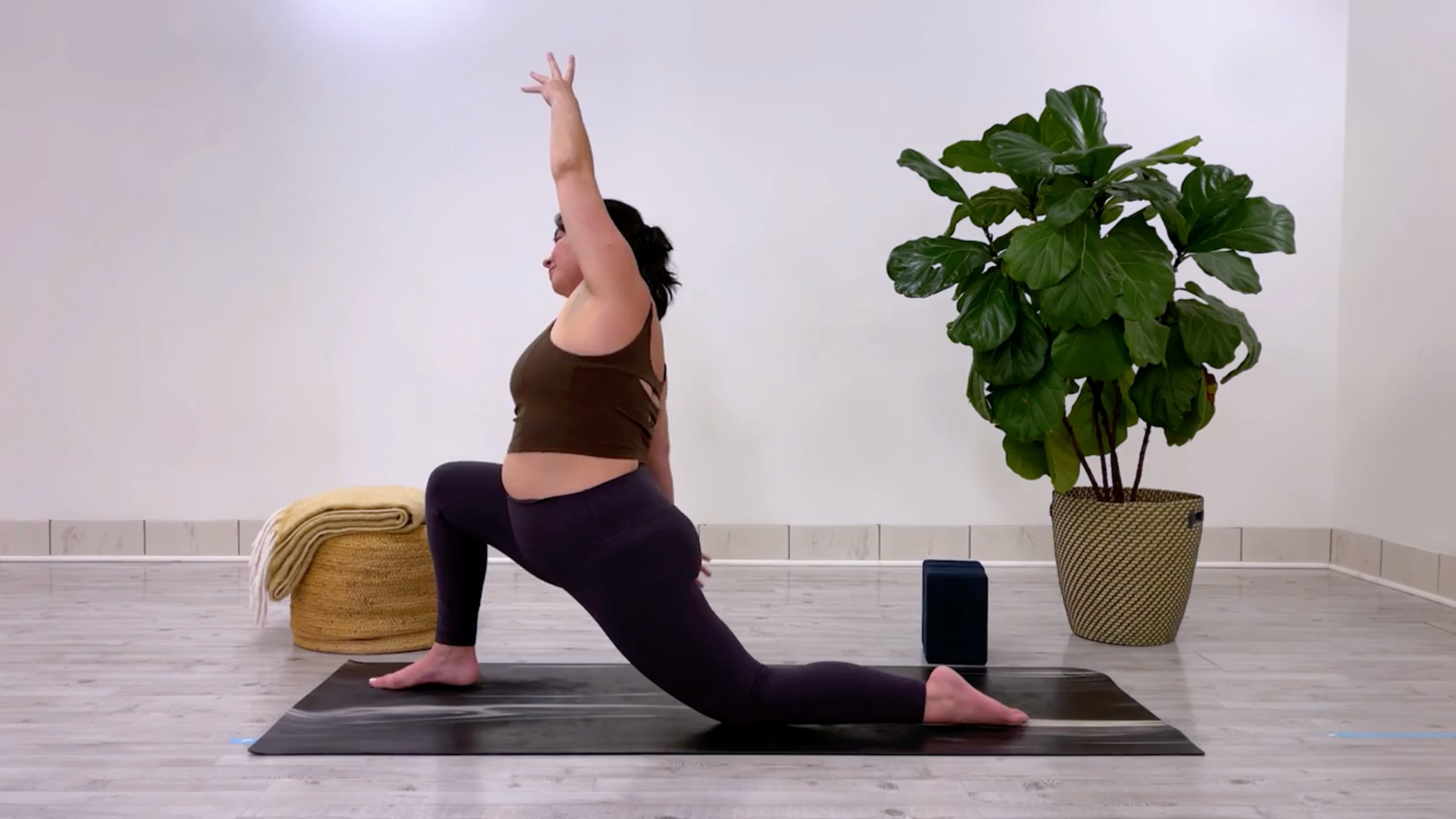 Yoga teacher Taylor Lorenz in Low Lunge, or Anjaneyasana in Sanskrit